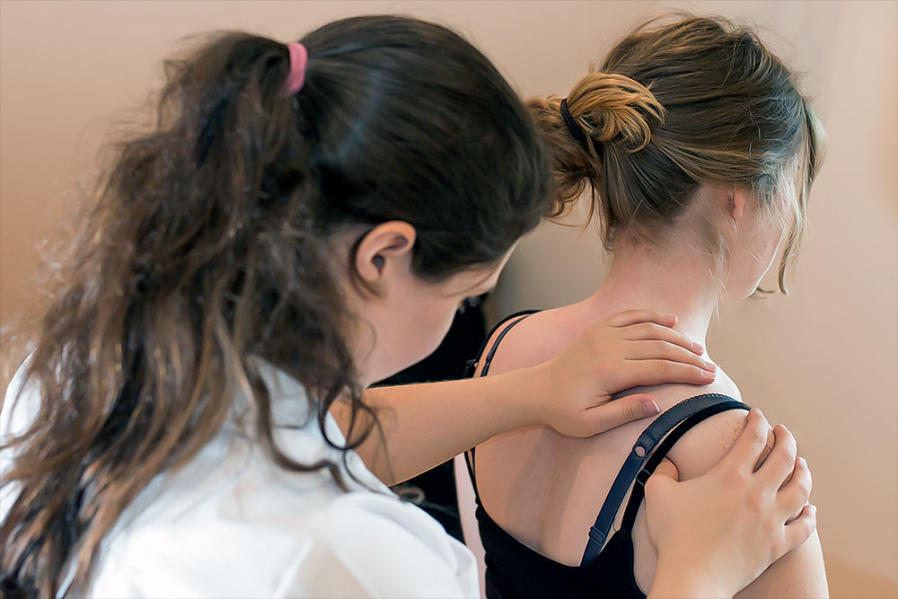 Katherine assessing patient